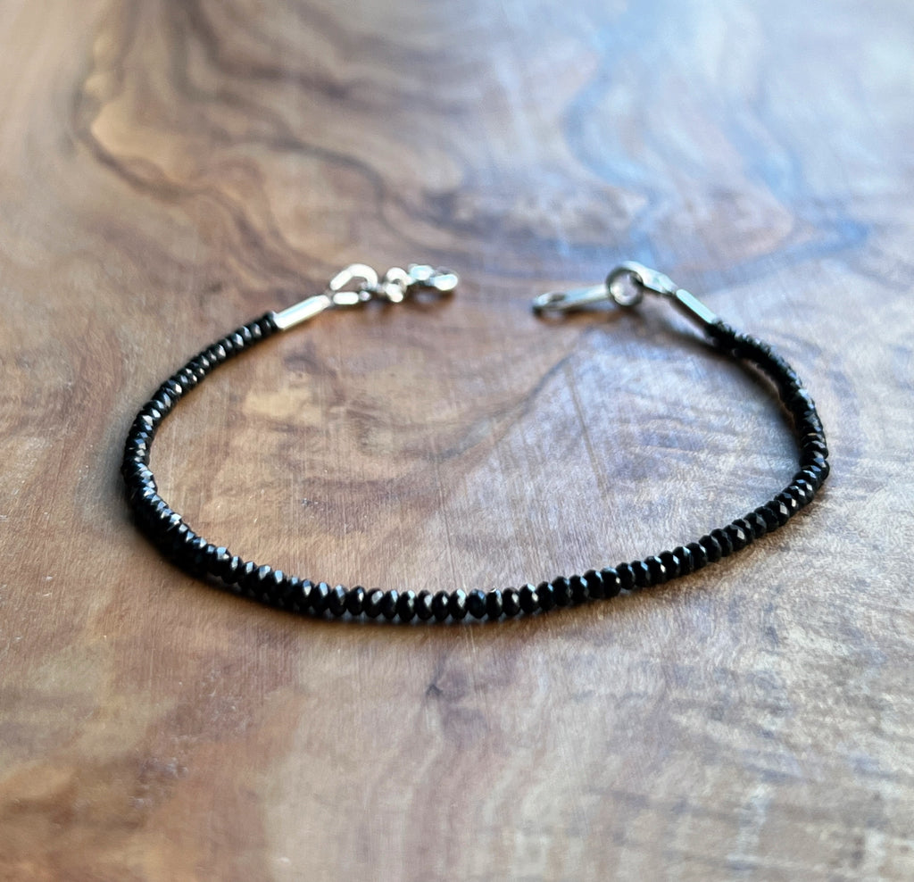 Black spinel gemstone with sterling silver bracelet