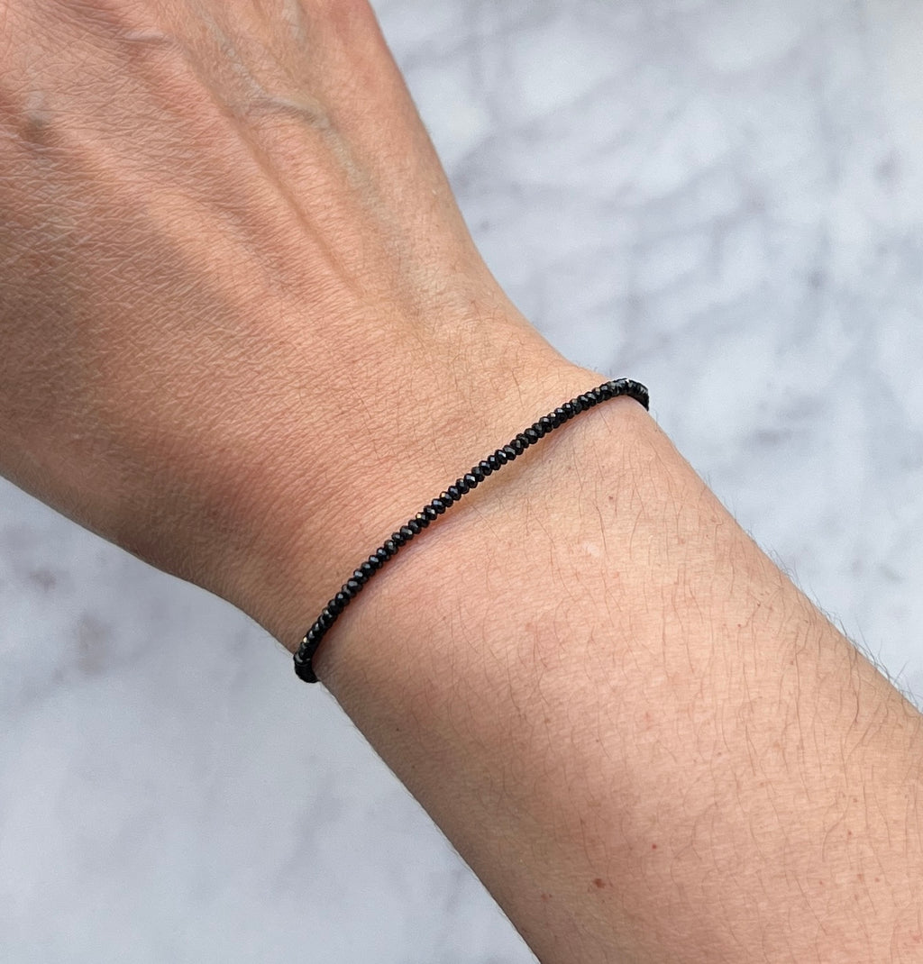 Black spinel gemstone with sterling silver bracelet