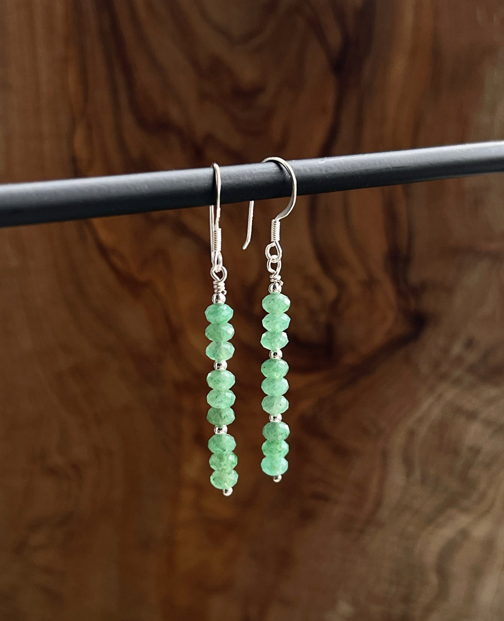 Faceted green aventurine gemstone with sterling silver earring