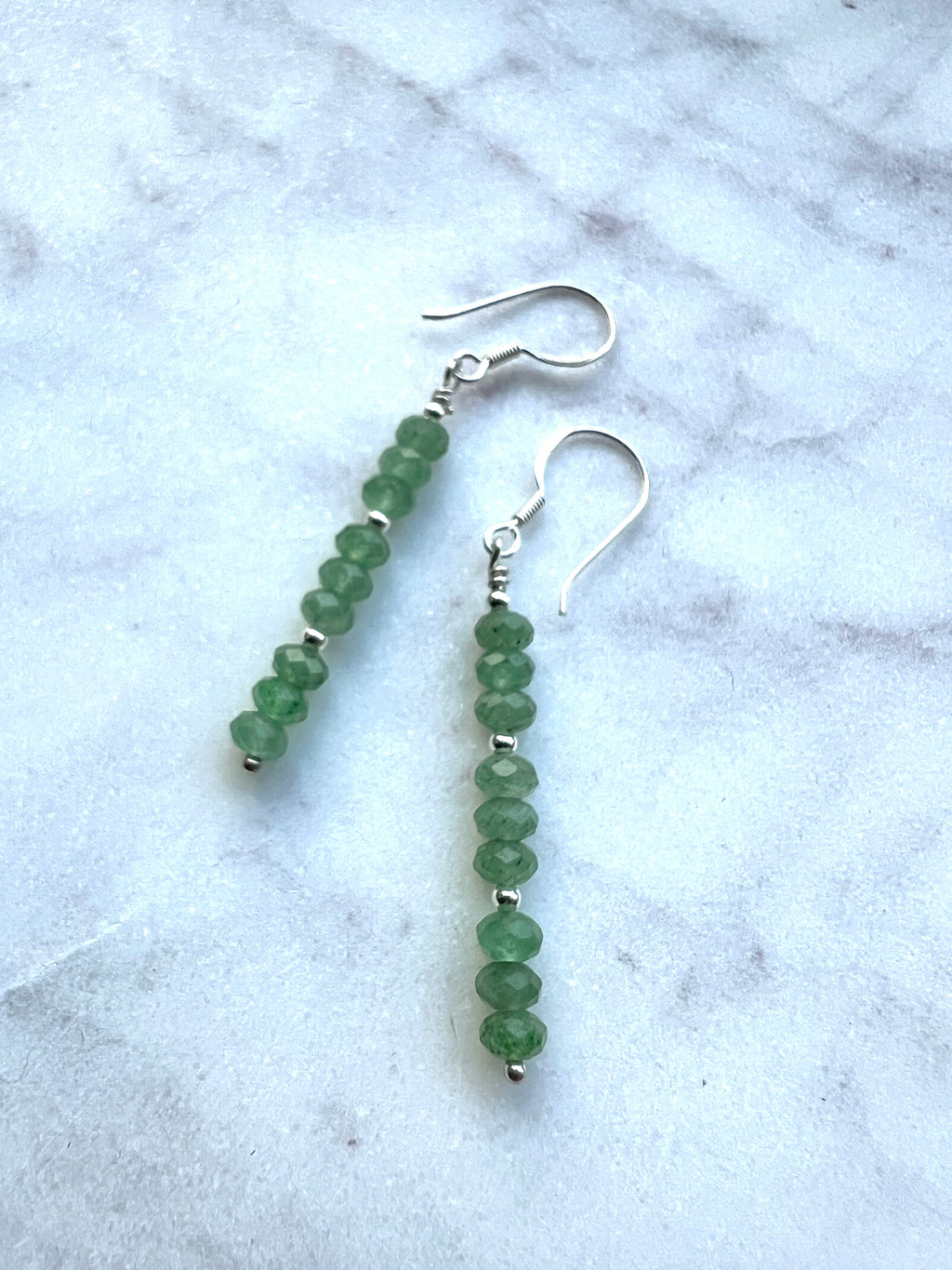 Faceted green aventurine gemstone with sterling silver earring