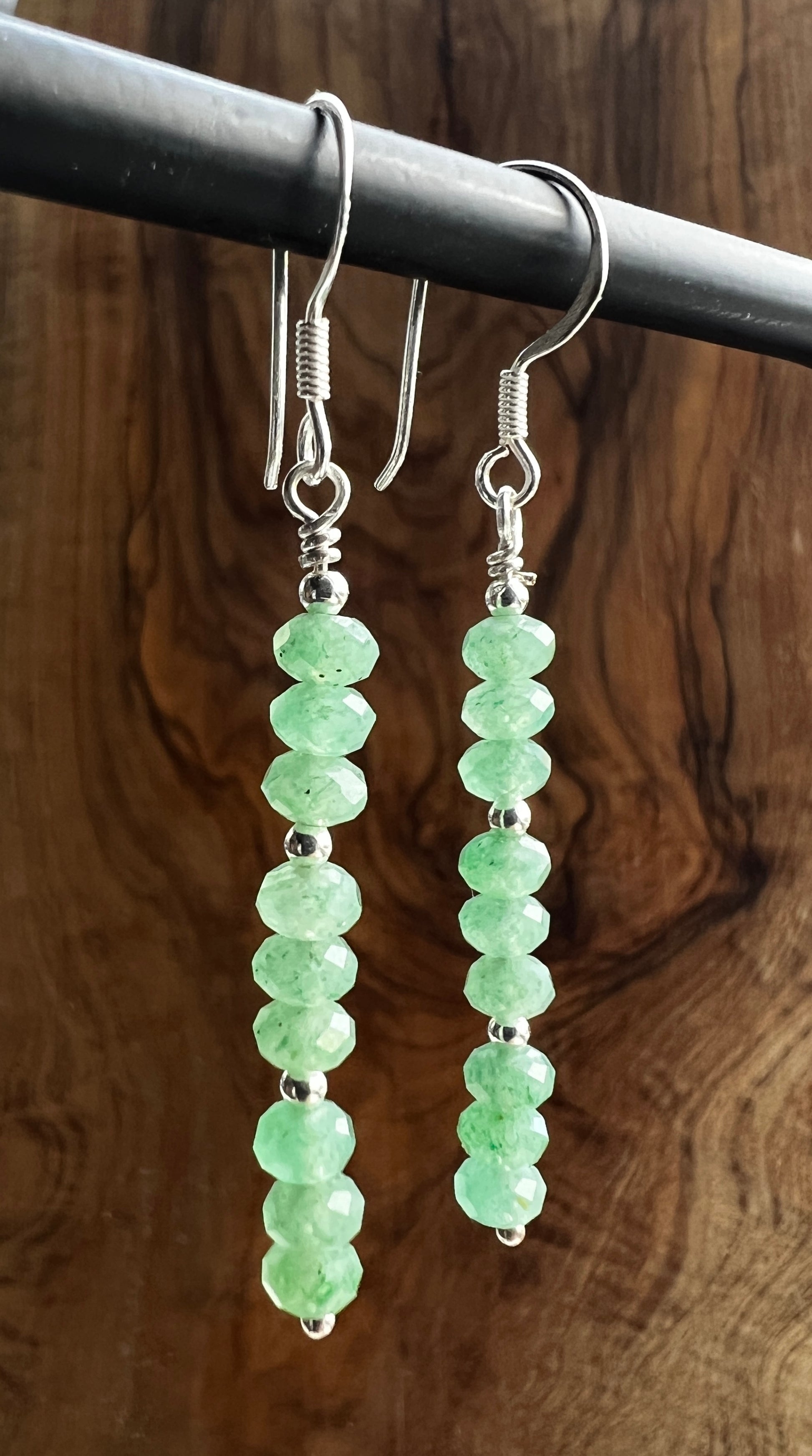 Faceted green aventurine gemstone with sterling silver earring