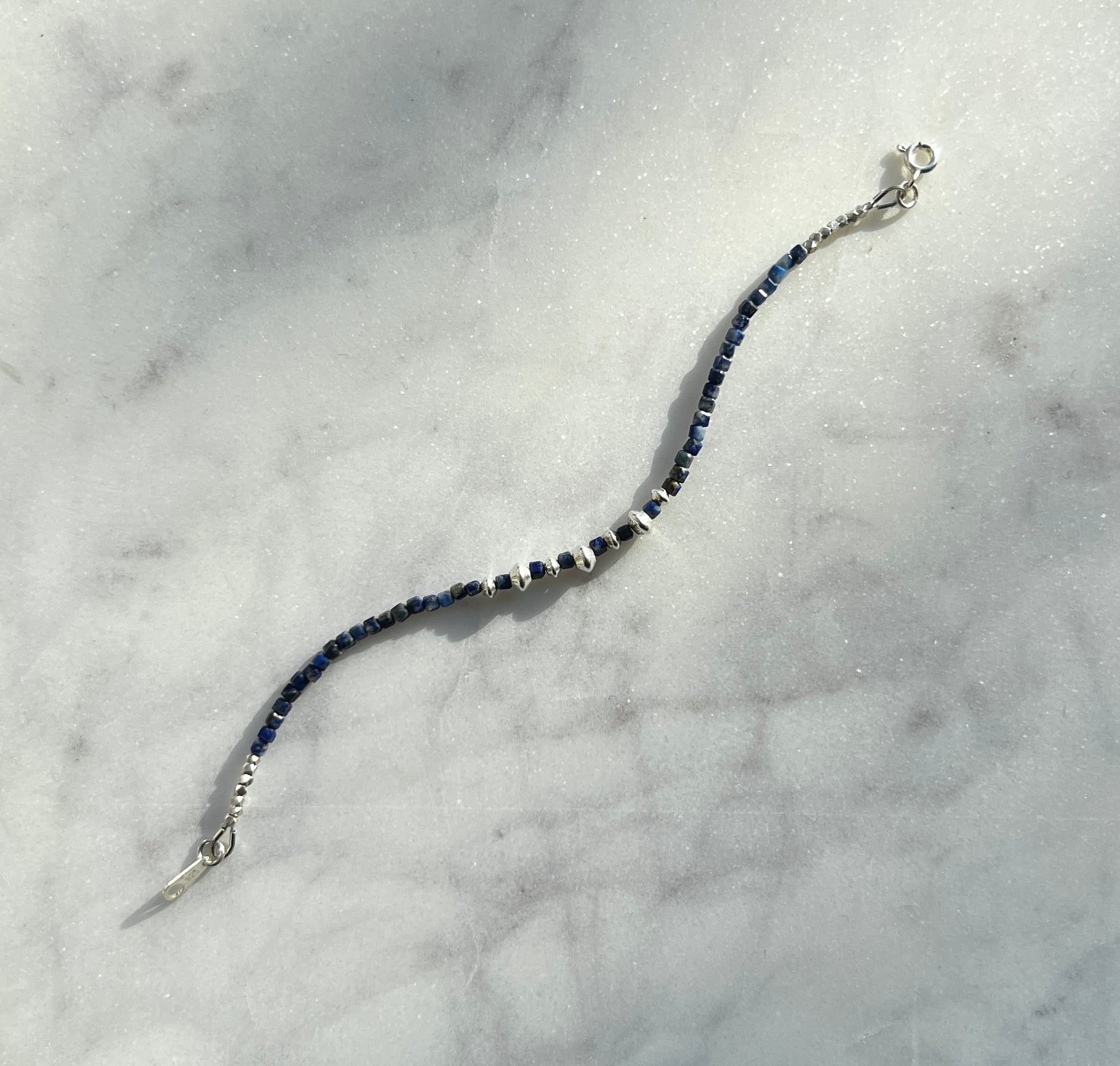 Lapis lazuli gemstone with sterling and fine silver bracelet