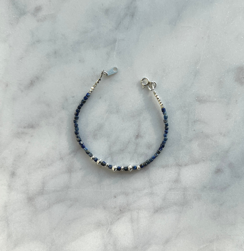 Lapis lazuli gemstone with sterling and fine silver bracelet