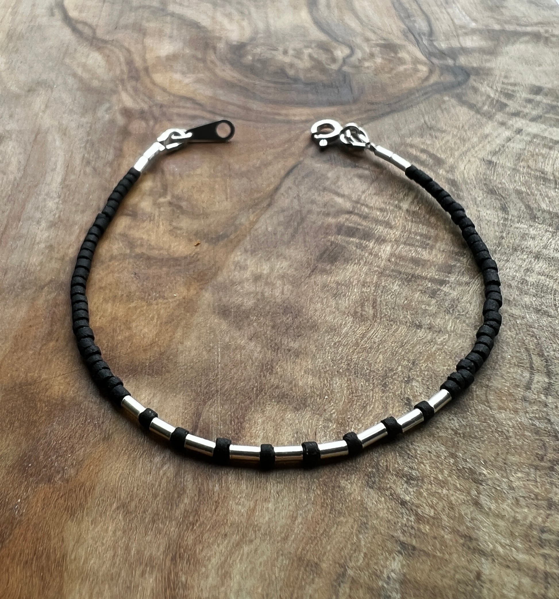 Sterling silver with black Afghan beads
