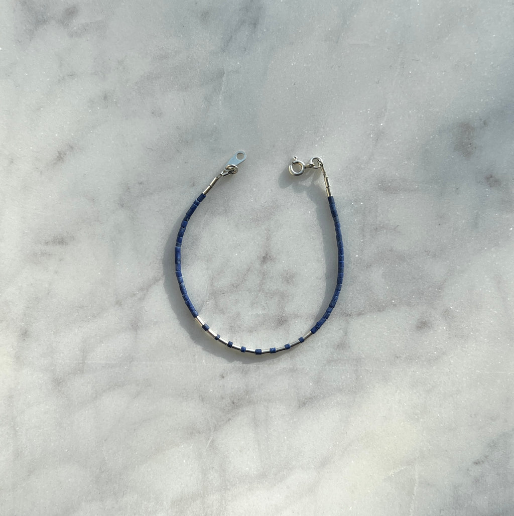 Sterling silver with blue Afghan beads