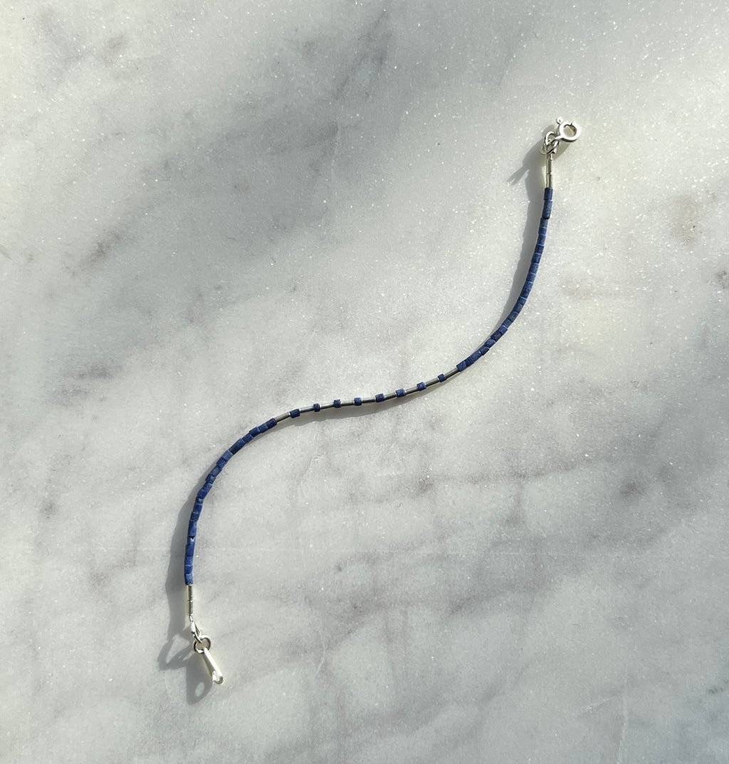 Sterling silver with blue Afghan beads