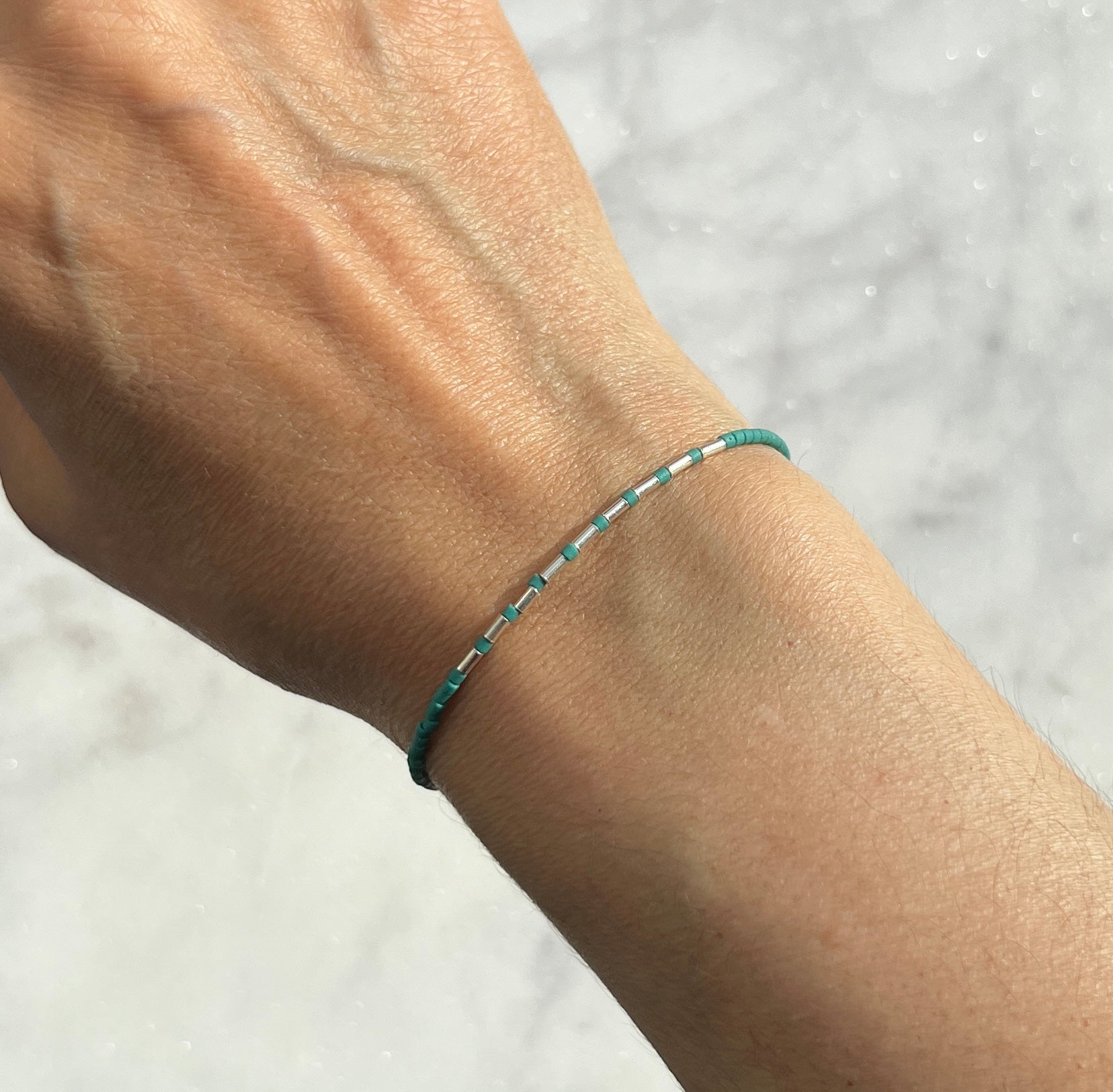 Sterling silver with dark turquoise Afghan beads