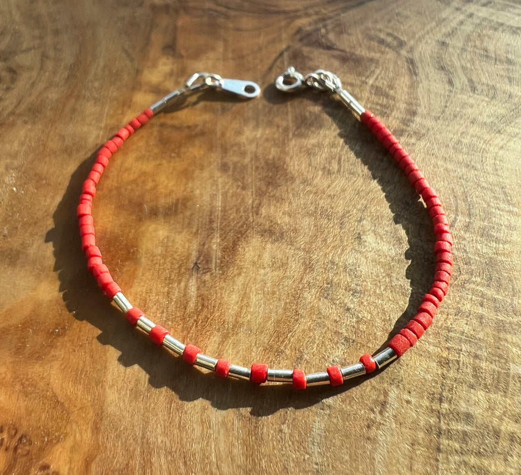 Sterling silver with red Afghan beads