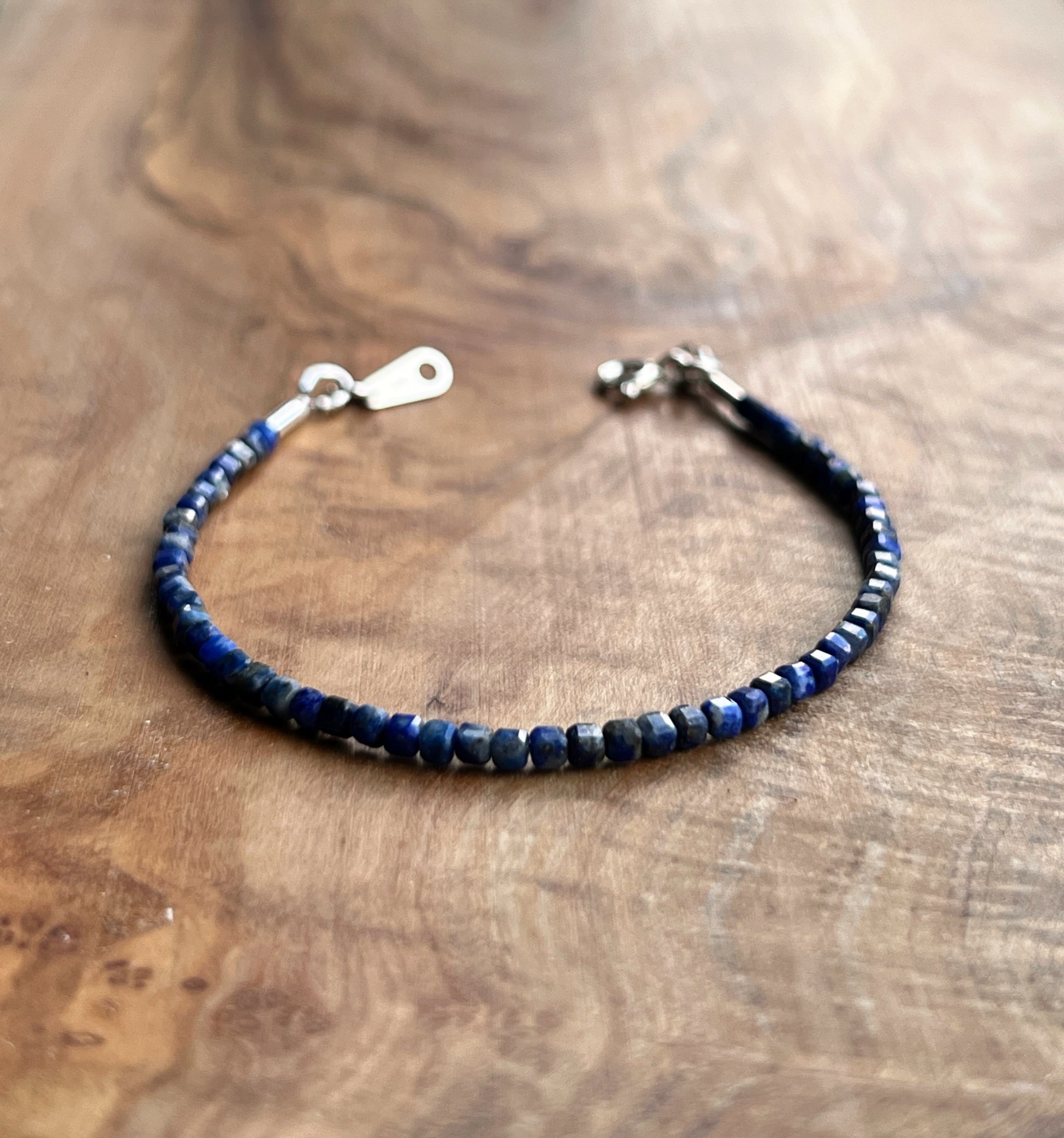 Blue lapis lazuli gemstone with sterling silver bracelet