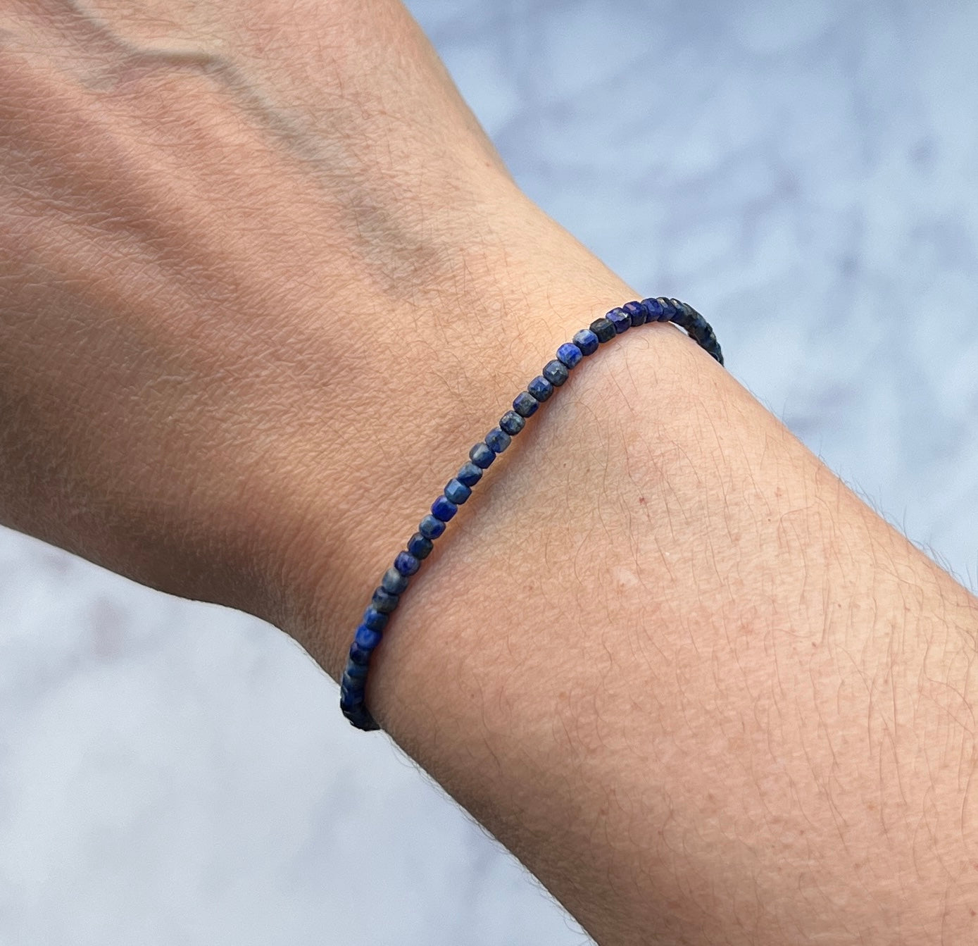 Blue lapis lazuli gemstone with sterling silver bracelet