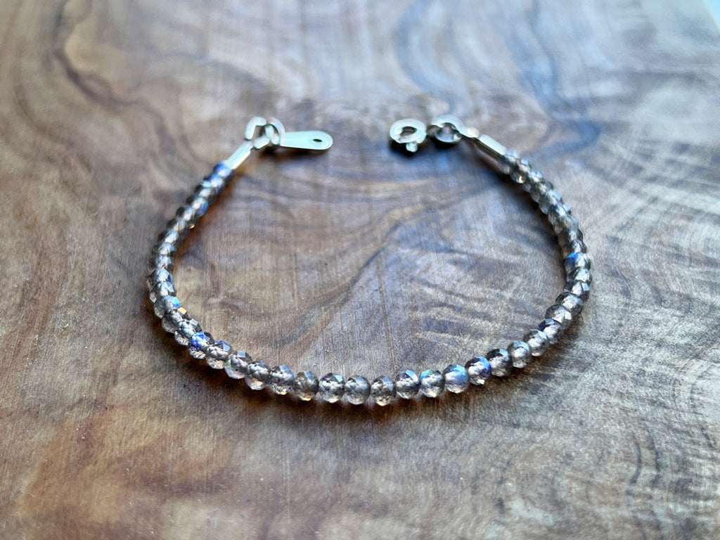 Iridescent labradorite micro faceted gemstone with sterling silver bracelet