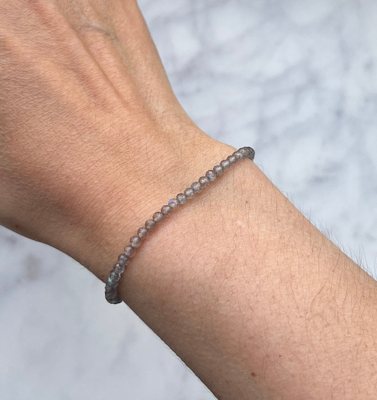 Iridescent labradorite micro faceted gemstone with sterling silver bracelet