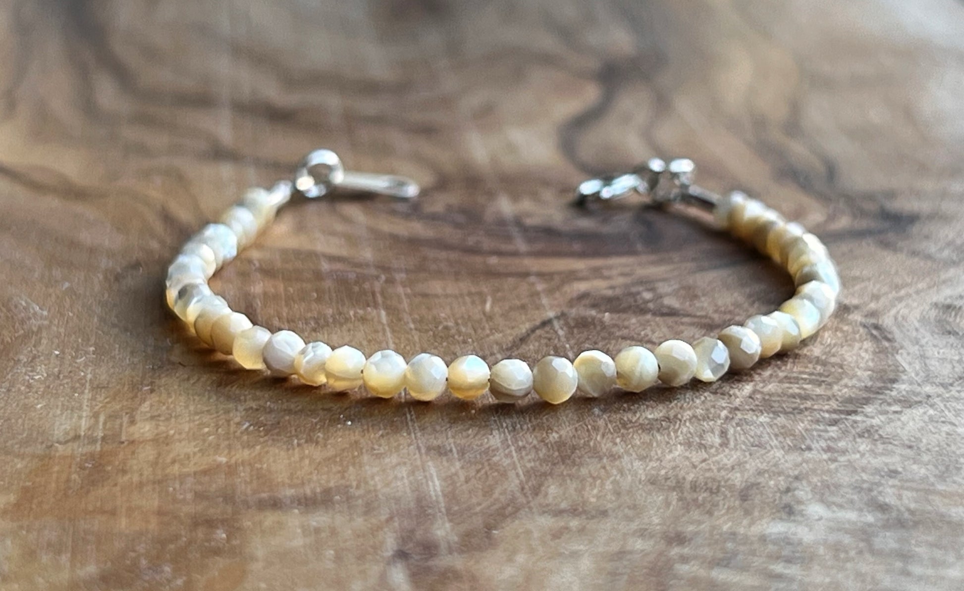 Faceted cream mother of pearl with sterling silver bracelet
