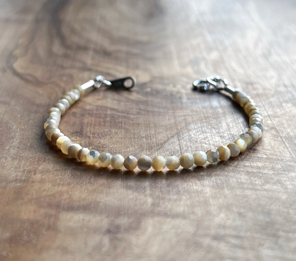 Faceted cream mother of pearl with sterling silver bracelet