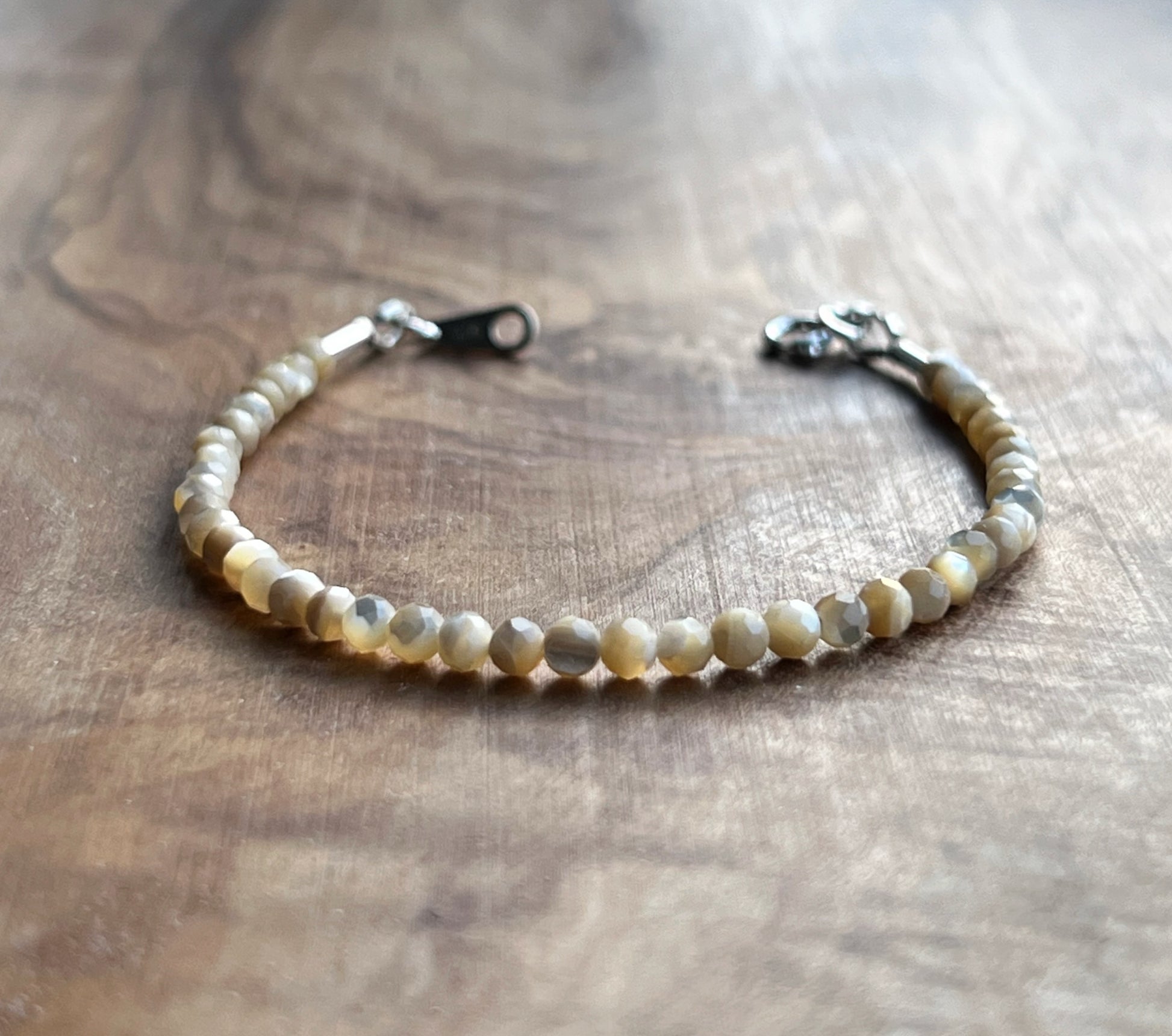 Faceted cream mother of pearl with sterling silver bracelet