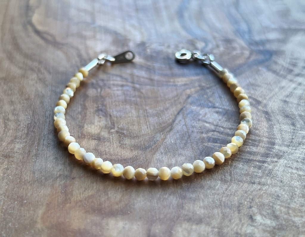 Faceted cream mother of pearl with sterling silver bracelet