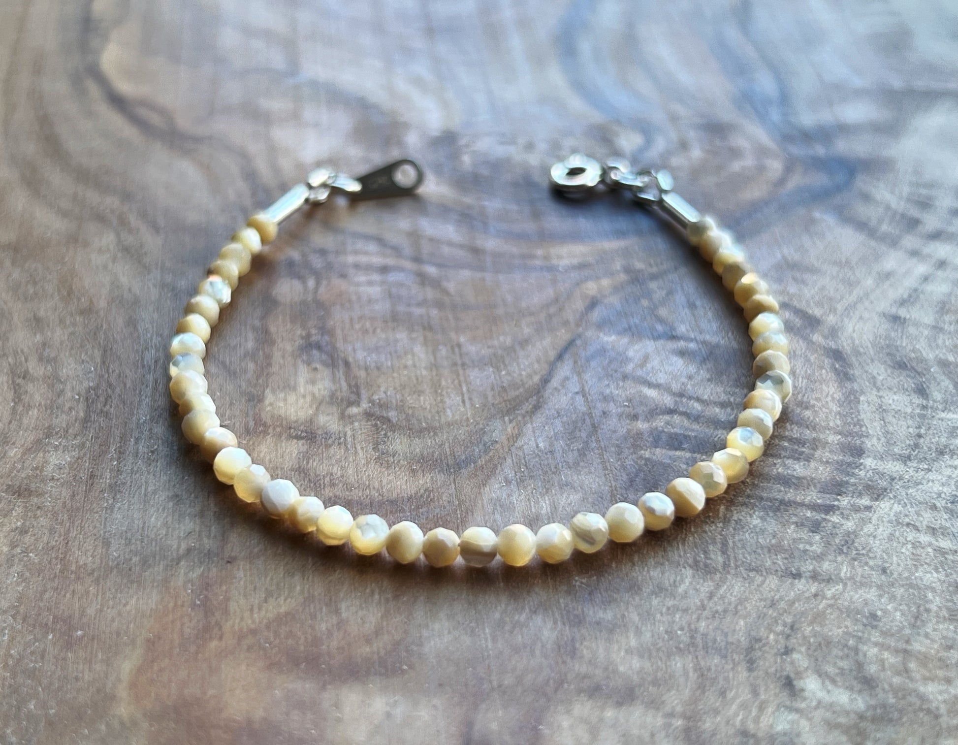 Faceted cream mother of pearl with sterling silver bracelet
