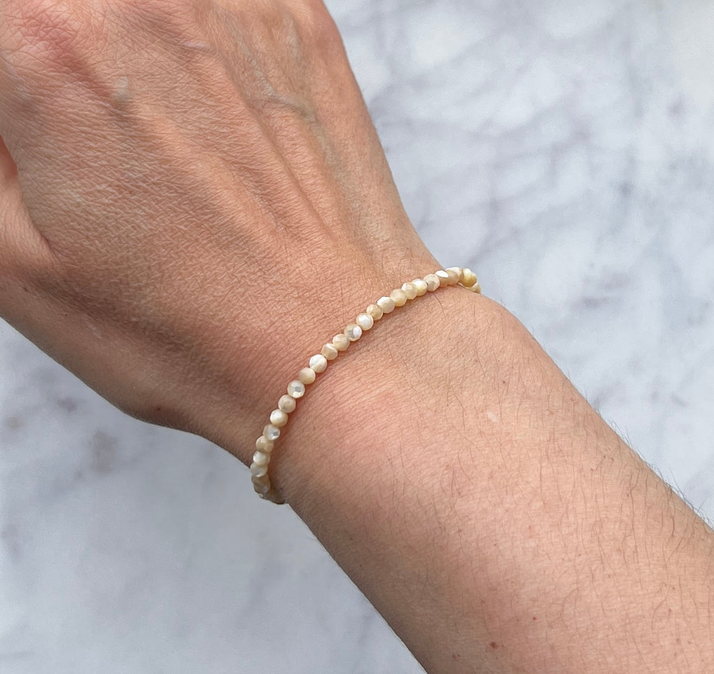 Faceted cream mother of pearl with sterling silver bracelet
