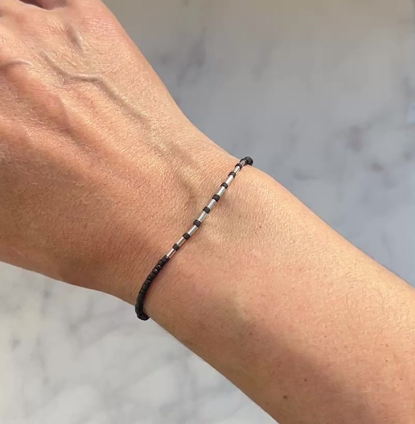 Sterling silver with black Afghan beads