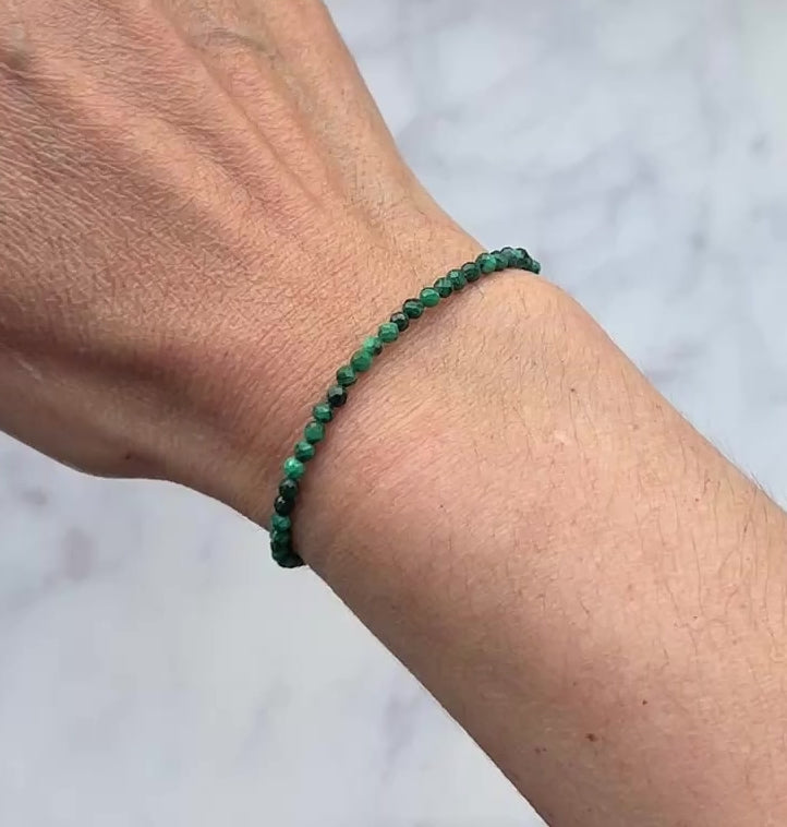 Green malachite faceted gemstone with sterling silver bracelet