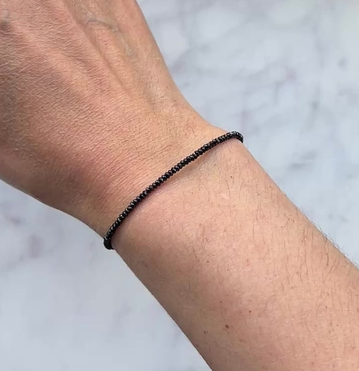 Black spinel gemstone with sterling silver bracelet