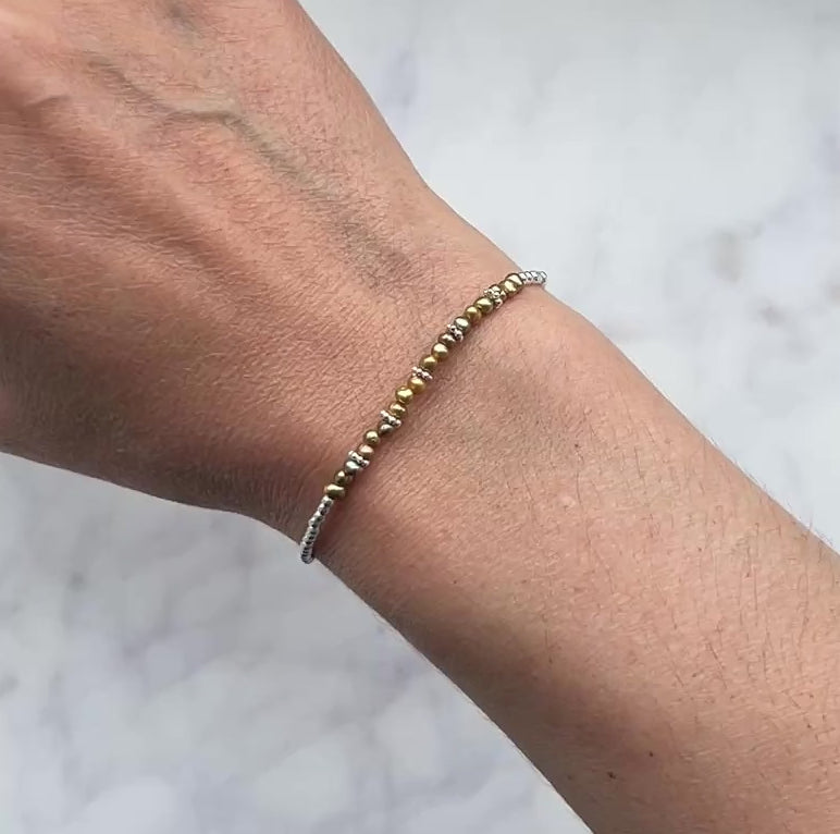 Sterling silver and olive green freshwater pearl bracelet.