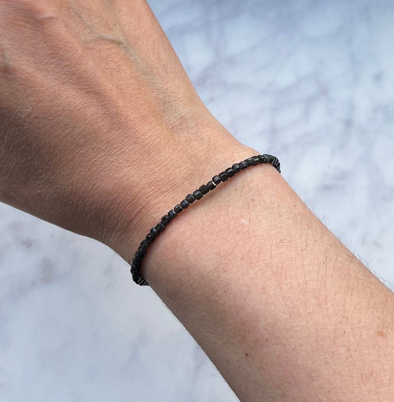 Rainbow obsidian gemstone with sterling silver bracelet