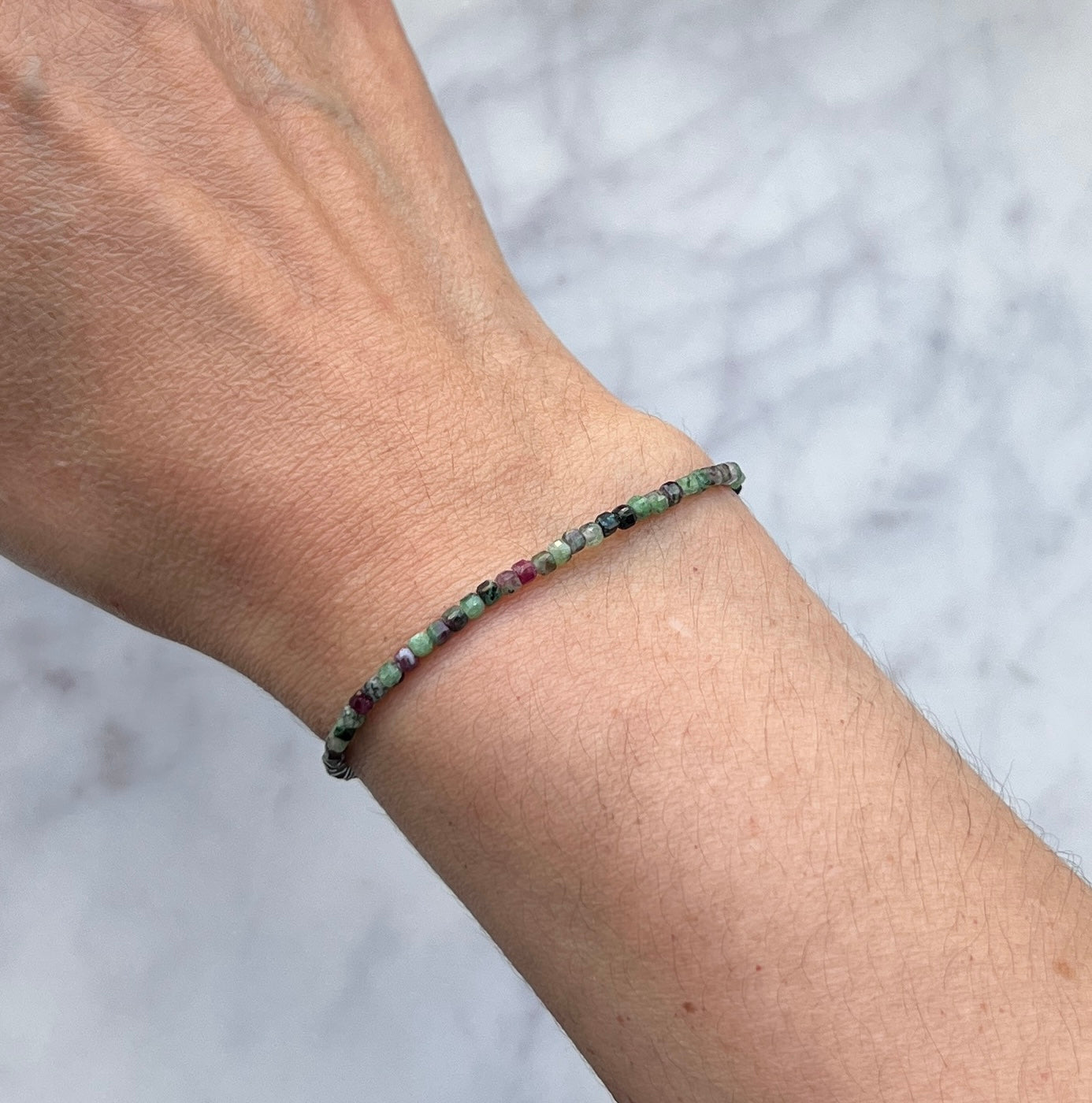 Green and pinkish ruby zoisite gemstone with sterling silver bracelet