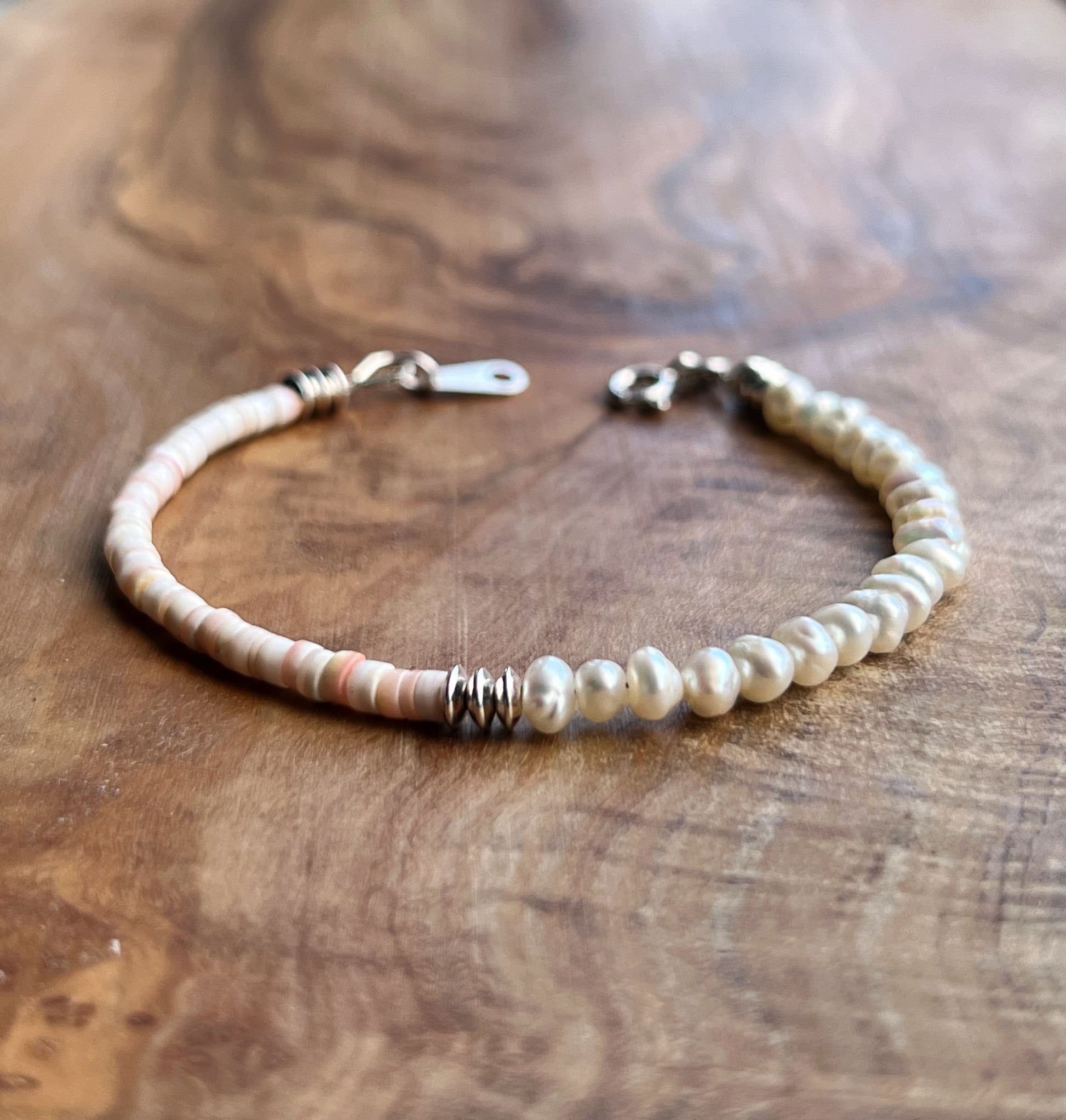 White freshwater pearl, light pink shell and sterling silver bracelet