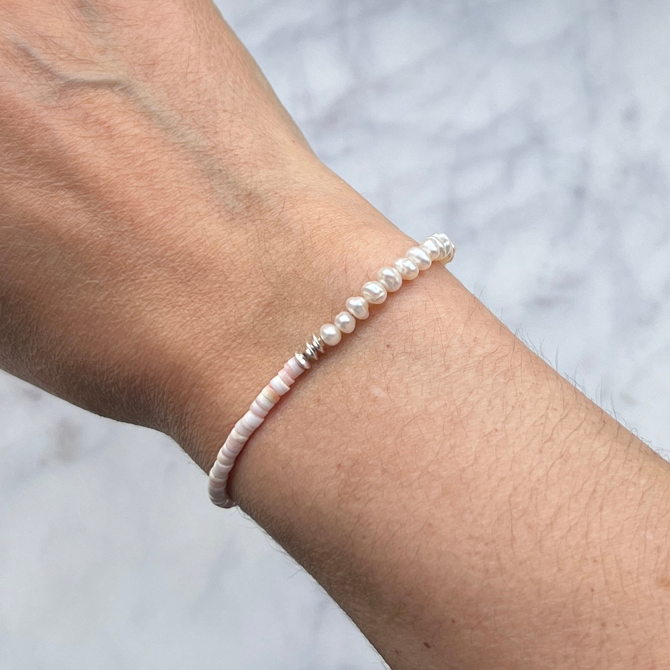 White freshwater pearl, light pink shell and sterling silver bracelet